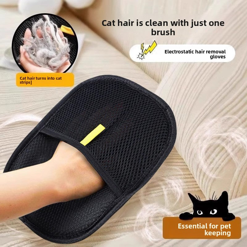 Electrostatic pet hair removal glove collecting dog fur from sofa